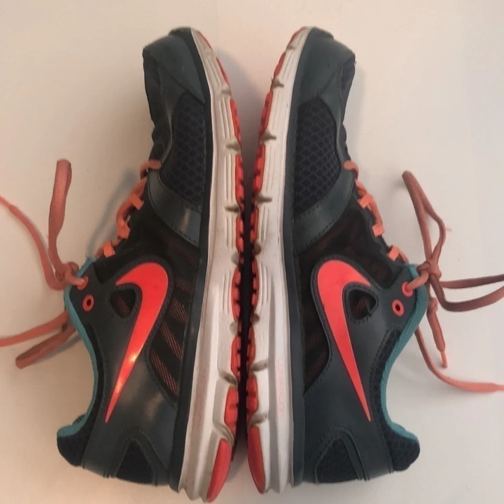 Nike Lunaforever running shoes in dark grey blue peachy colors side swoosh